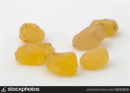 Dried white grapes on a white background