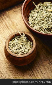 Dried wormwood in a bowl. Mugwort homeopathic herbs in herbal medicine.Absinth, cure. Dried wormwood medicinal