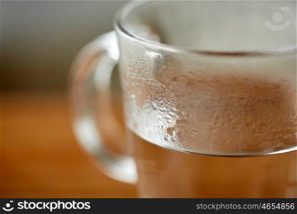 drink concept - close up of glass with hot water. close up of glass with hot water
