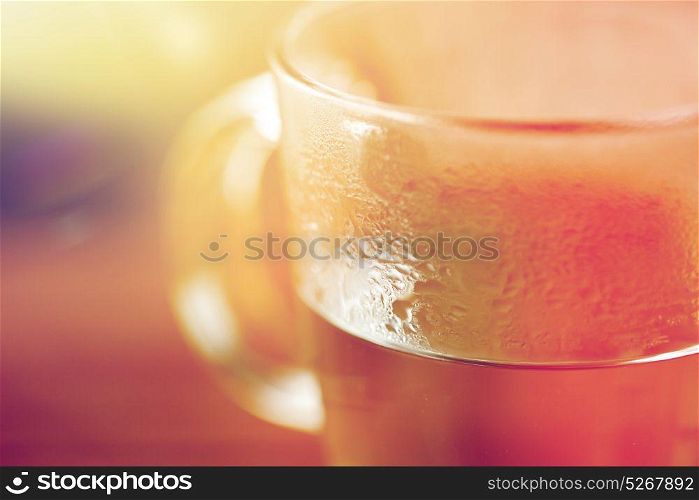 drink concept - close up of glass with hot water. close up of glass with hot water