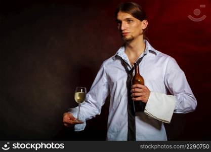 Drink winery liquor relax concept. Waiter serving wine bottle. Steward holds glass with alcohol beverage.. Waiter serving wine bottle.