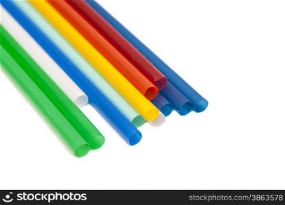 Drinking differently shaped colorful straws isolated over white background