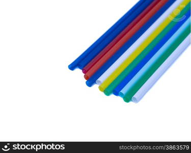 Drinking differently shaped colorful straws isolated over white background