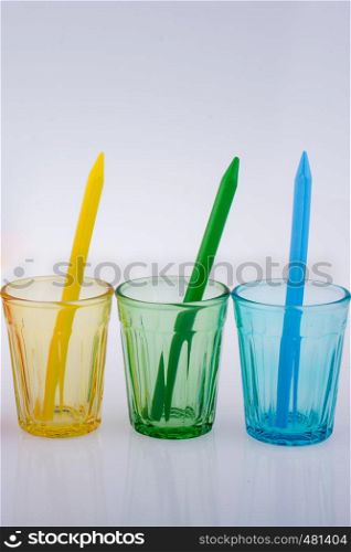 Drinking glasses of various color with patterns