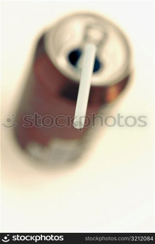 Drinking straw in a drink can