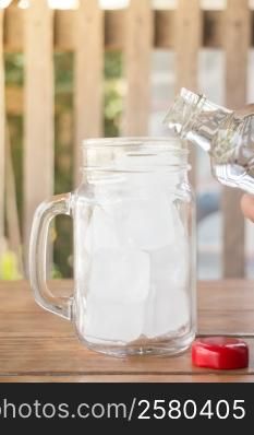 Drinking water and iced glass, stock photo