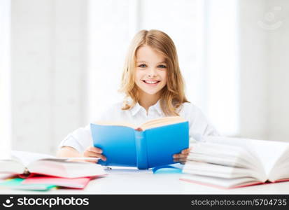 drinks, winter holidays, christmas, luxury and celebration concept - smiling woman in evening dress holding cocktail over black snowy background