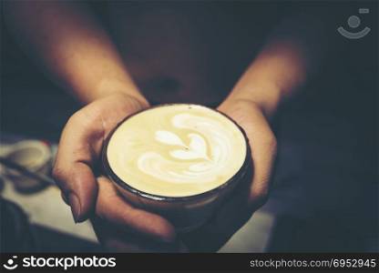 Drip coffee latte art, vintage filter image