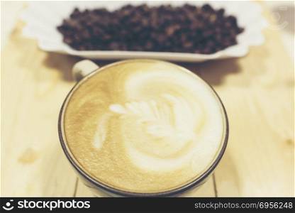 Drip coffee latte art, vintage filter image