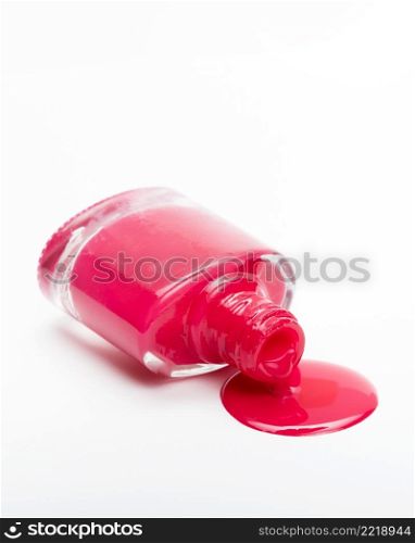 dripping red nail polish white surface