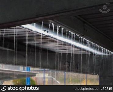 Dripping water on a roof in torrential rain