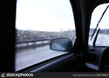 drive on rain window in drops