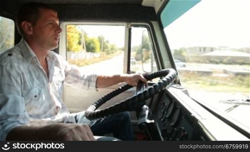 Driver at the wheel of delivery truck