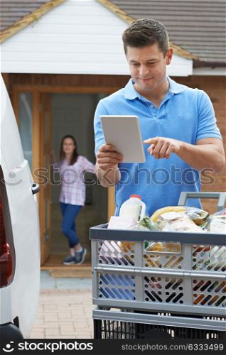 Driver Delivering Online Grocery Order To House