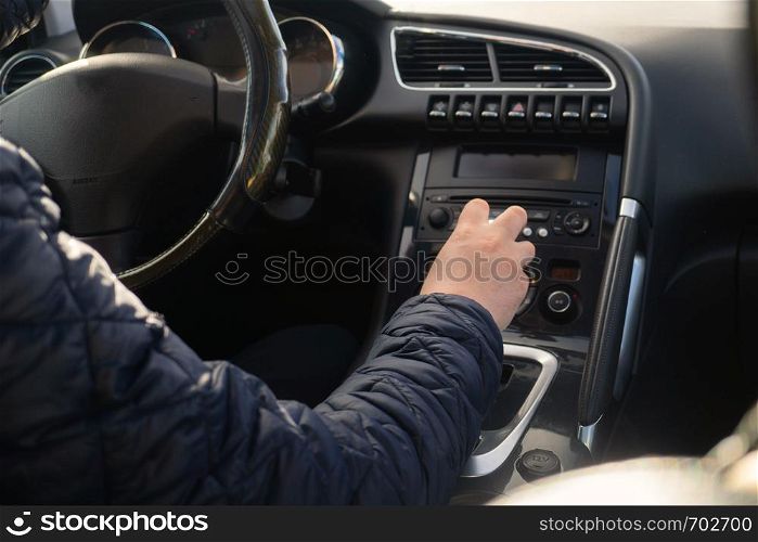 Driver man hand holding automatic transmission in car.. Driver man hand holding automatic transmission in car