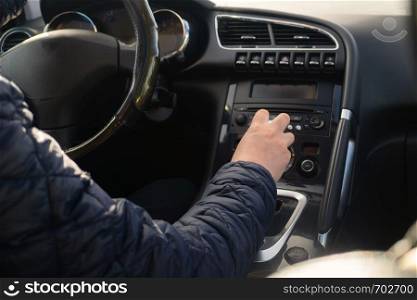 Driver man hand holding automatic transmission in car.. Driver man hand holding automatic transmission in car