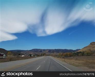 Driving along a rural road in Colorado, United States