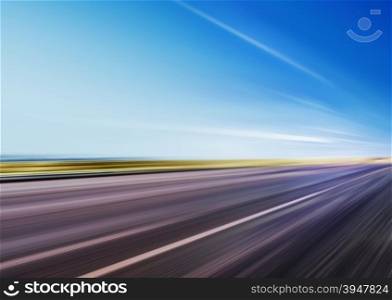 driving at high speed in empty road - motion blur