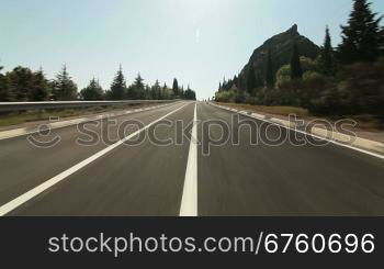 Driving car on a mountain road along the coast of the Black Sea. Yalta, Crimea