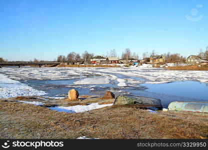 driving of ice on river near villages