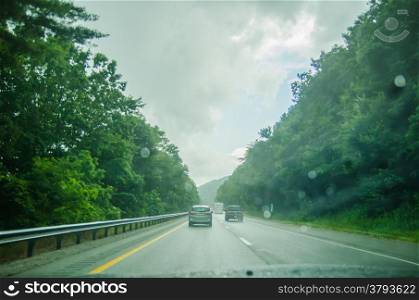 driving on an american highway system in bad weather