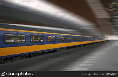 Driving train at Central Station in Amsterdam Netherlands