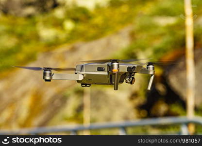 Drone flying against nature, take photo and video. Drone flying against nature