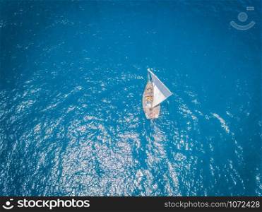 Drone picture of a traditional dhow sailboat sailing in the Indian ocean, Tanzania.