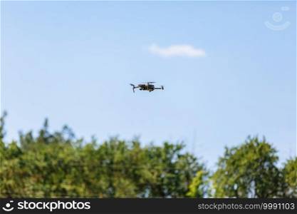 drone quad copter on green corn field.. drone quad copter on green corn field