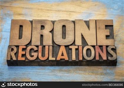 drone regulations word abstract in vintage letterpress wood type
