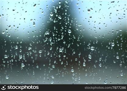 droplets of water on glass. droplets of water on glass during the rain