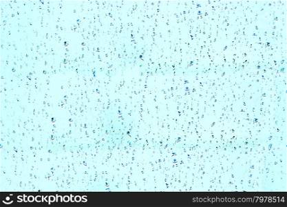 droplets of water on the glass. droplets of water on the glass during the rain