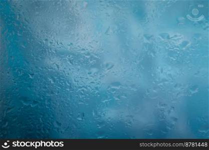 Drops of rain on glass raindrops on clear window
