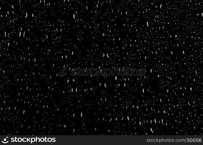 Drops of water on a dark glass texture background