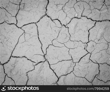 Drought land - cracked texture background in Black and white image. Global warming effect