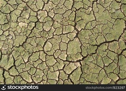 Drought, the ground cracks no hot water lack of moisture top view