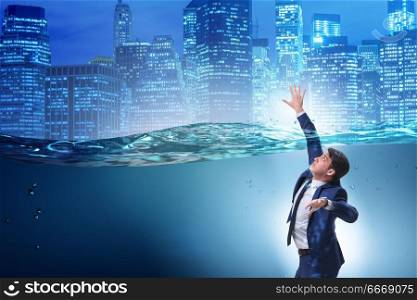 Drowning businessman in insolvency and bankruptcy concept