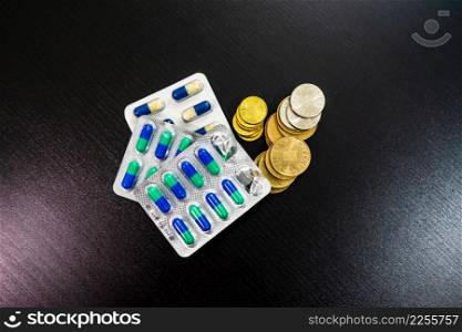 Drug capsule pills, medicine and vitamins on the table