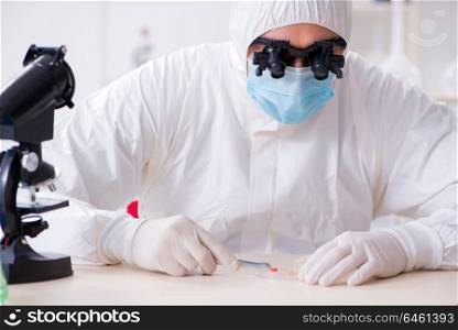 Drug synthesis concept with chemist working in research lab