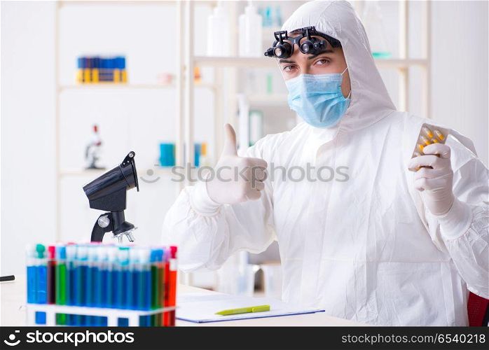 Drug synthesis concept with chemist working in research lab