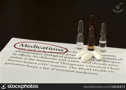 Drugs on the score sheet with text medications