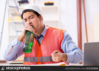 Drunk engineer working in the workshop