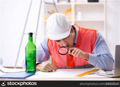 Drunk engineer working in the workshop