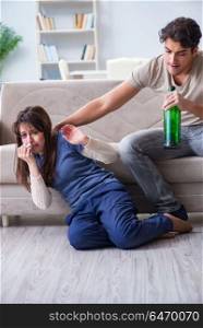 Drunk husband abusing wife in domestic violence concept