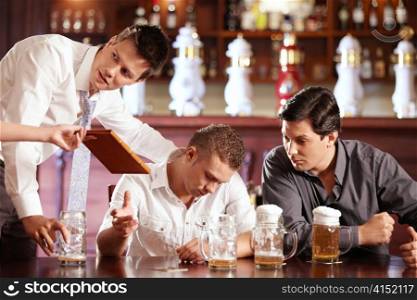 Drunk man stretches out from the waitress