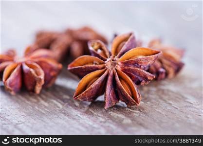 dry anise on the wooden board, aroma spice