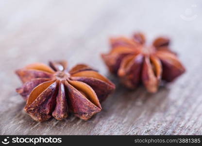 dry anise on the wooden board, aroma spice