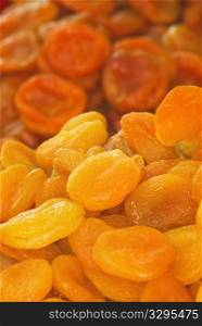 Dry apricots arranged at the background