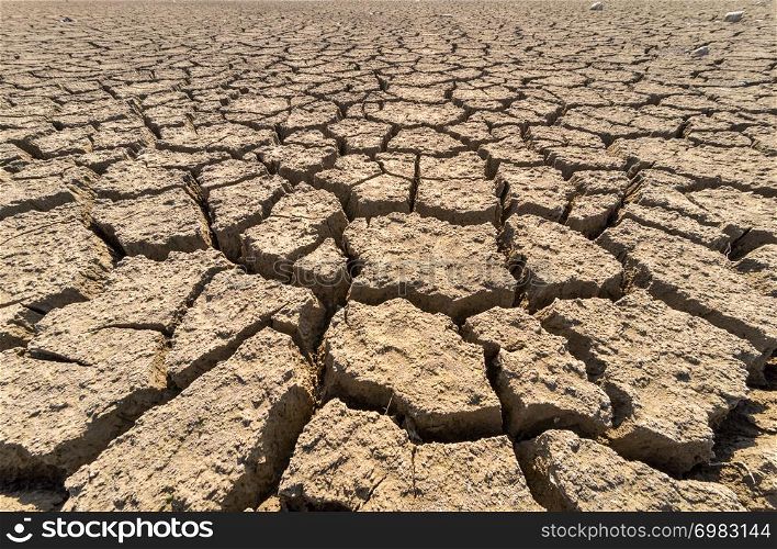 Dry cracked desert. Background. The global shortage of water on the planet.