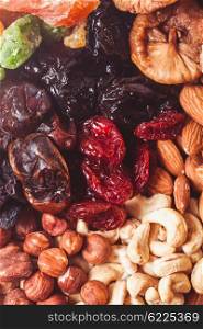 Dry fruits and nuts background - close up healthy sweets. Dry fruits and nuts